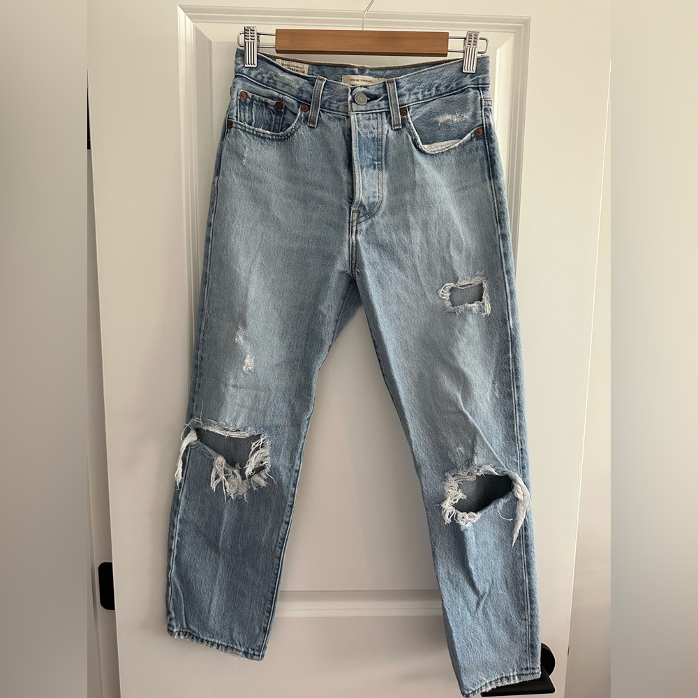 Distressed Light Blue Levi’s Jeans